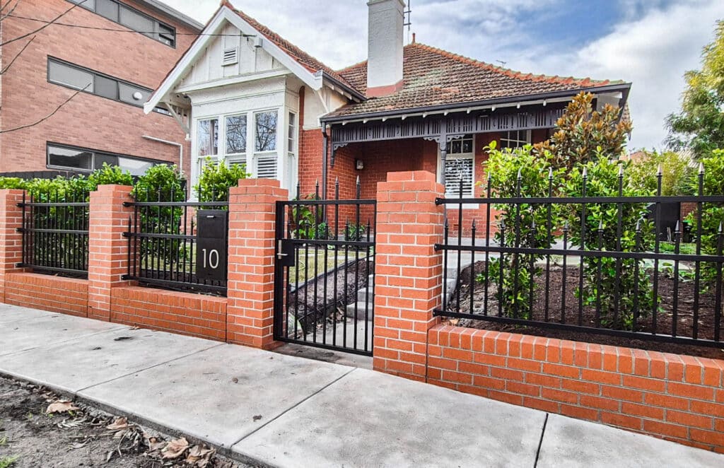 Brick Fence in Elwood by Black Barrow