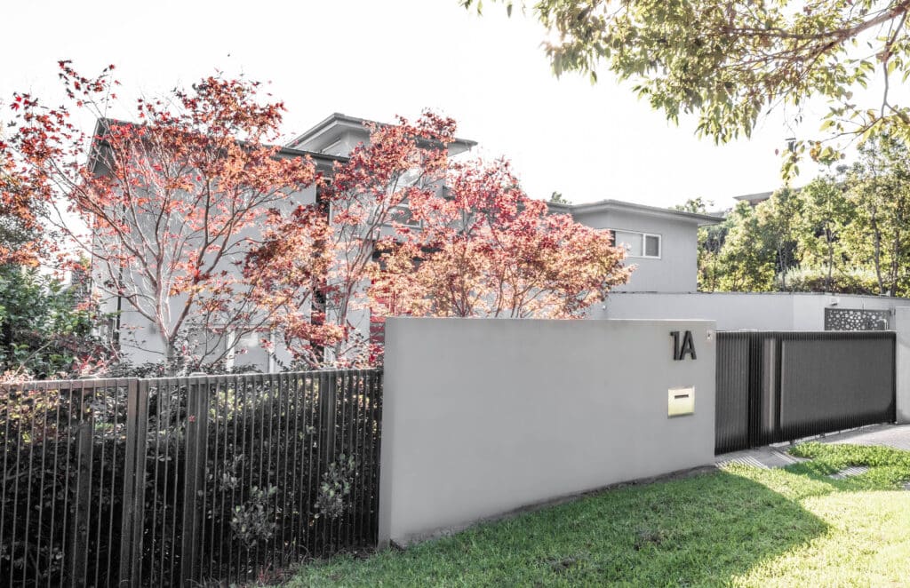 Brick Fence in Hawthorn East by Black Barrow